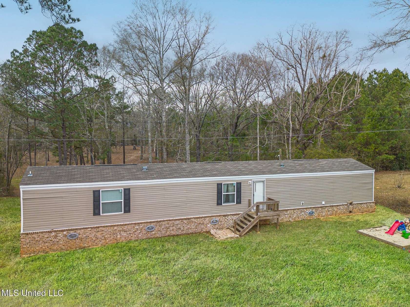 2.5 Acres of Residential Land with Home for Sale in Wiggins, Mississippi