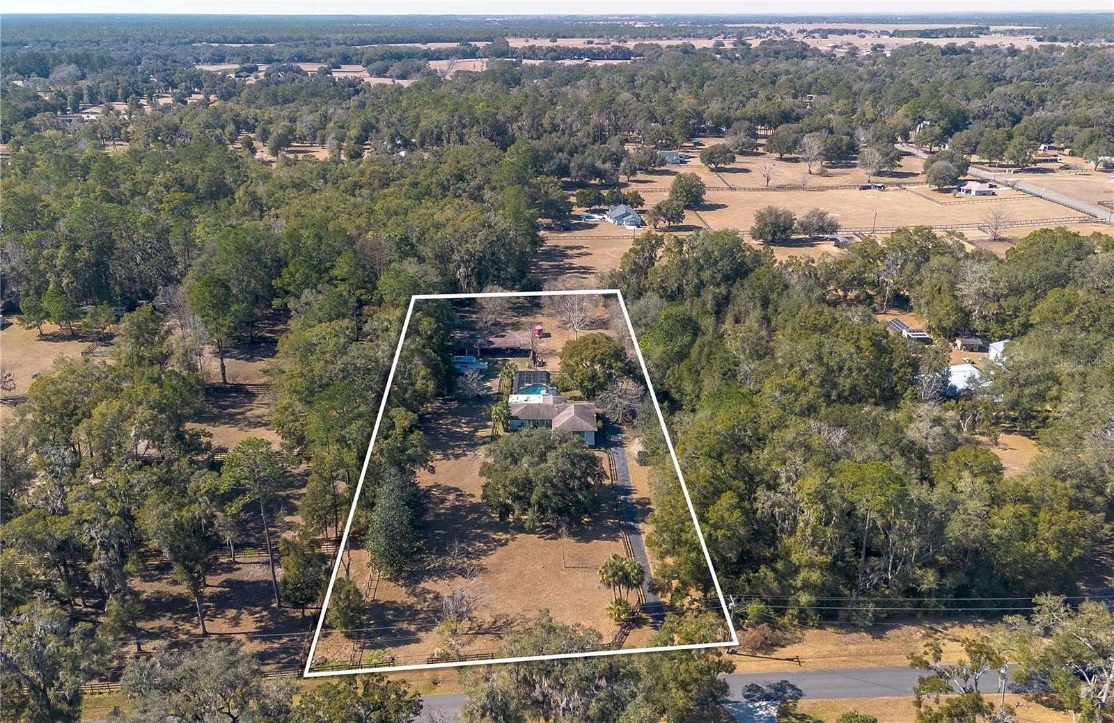 2.4 Acres of Residential Land with Home for Sale in Ocala, Florida