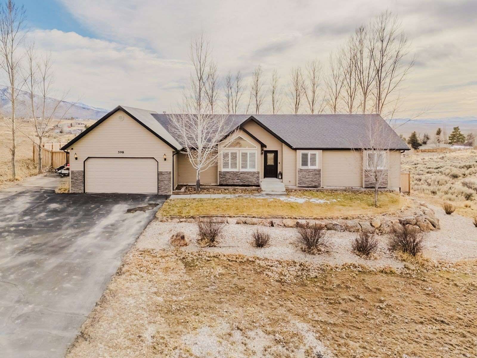 1.5 Acres of Residential Land with Home for Sale in Spring Creek, Nevada