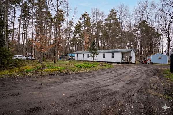 1.58 Acres of Land with Home for Sale in Milton, New Hampshire