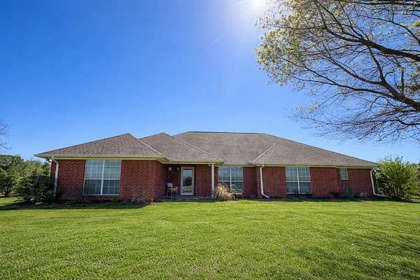 23.4 Acres of Agricultural Land with Home for Sale in Linden, Texas