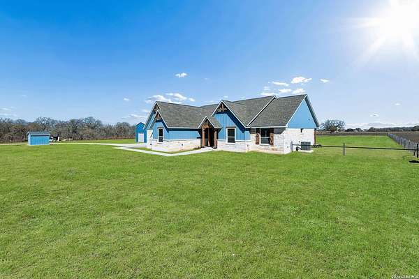 23.6 Acres of Recreational Land with Home for Sale in Stockdale, Texas