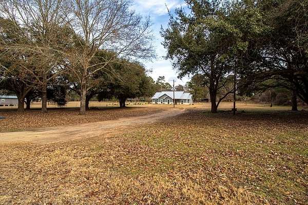 2 Acres of Residential Land with Home for Sale in Grapeland, Texas
