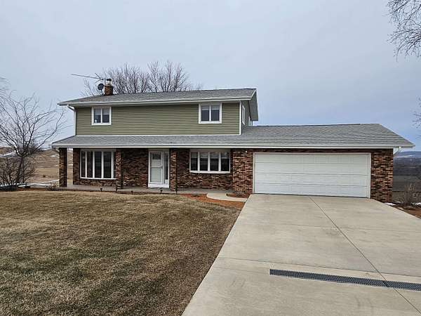 5.34 Acres of Residential Land with Home for Sale in Durango, Iowa