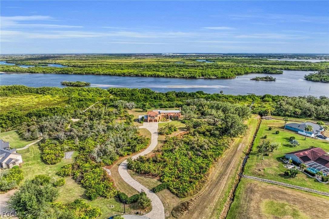 4.13 Acres of Residential Land with Home for Sale in Punta Gorda, Florida