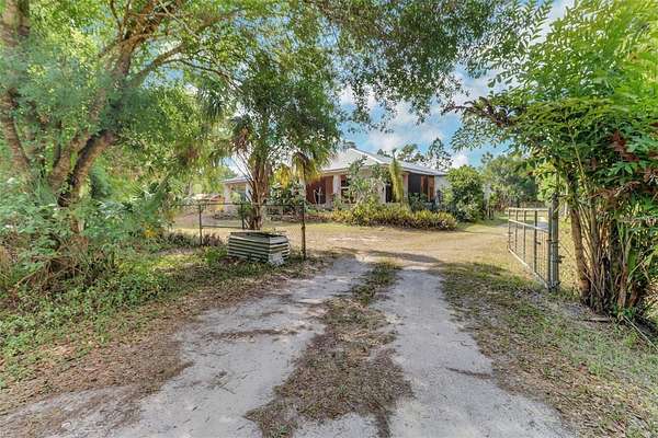 4.77 Acres of Residential Land with Home for Sale in Naples, Florida