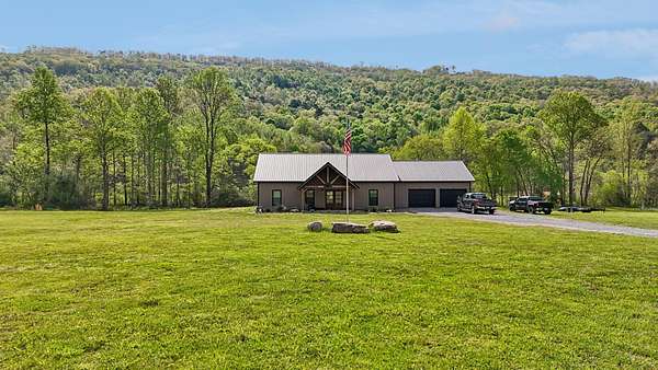 40.3 Acres of Land with Home for Sale in Bryant, Alabama