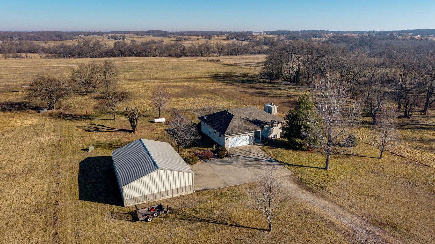 5 Acres of Residential Land with Home for Sale in Aurora, Missouri