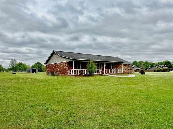 1.5 Acres of Land with Home for Sale in Pottsville, Arkansas