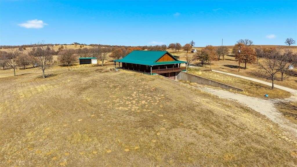 7.39 Acres of Residential Land with Home for Sale in Nocona, Texas