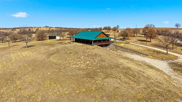 7.39 Acres of Residential Land with Home for Sale in Nocona, Texas