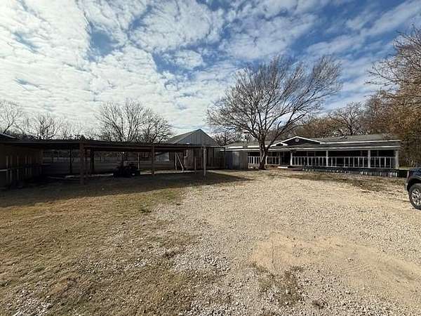 2.59 Acres of Residential Land with Home for Sale in Weatherford, Texas