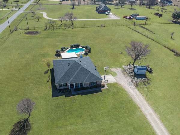 3 Acres of Residential Land with Home for Sale in Scurry, Texas