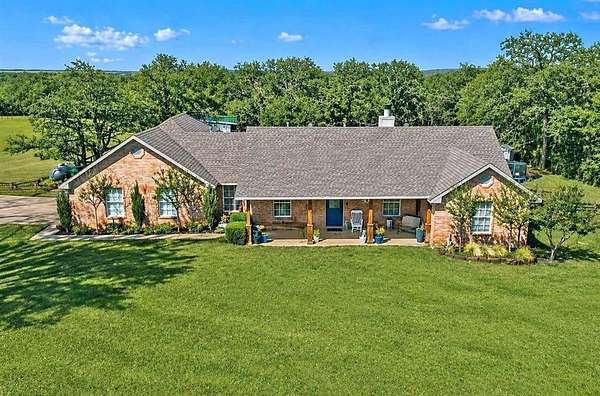 1.69 Acres of Land with Home for Sale in Aubrey, Texas