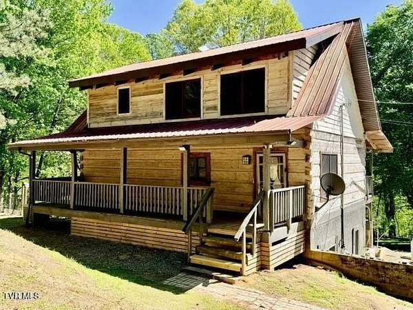 4.77 Acres of Land with Home for Sale in Roan Mountain, Tennessee