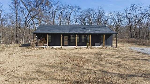 5 Acres of Residential Land with Home for Sale in Big Cabin, Oklahoma
