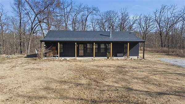 5 Acres of Residential Land with Home for Sale in Big Cabin, Oklahoma