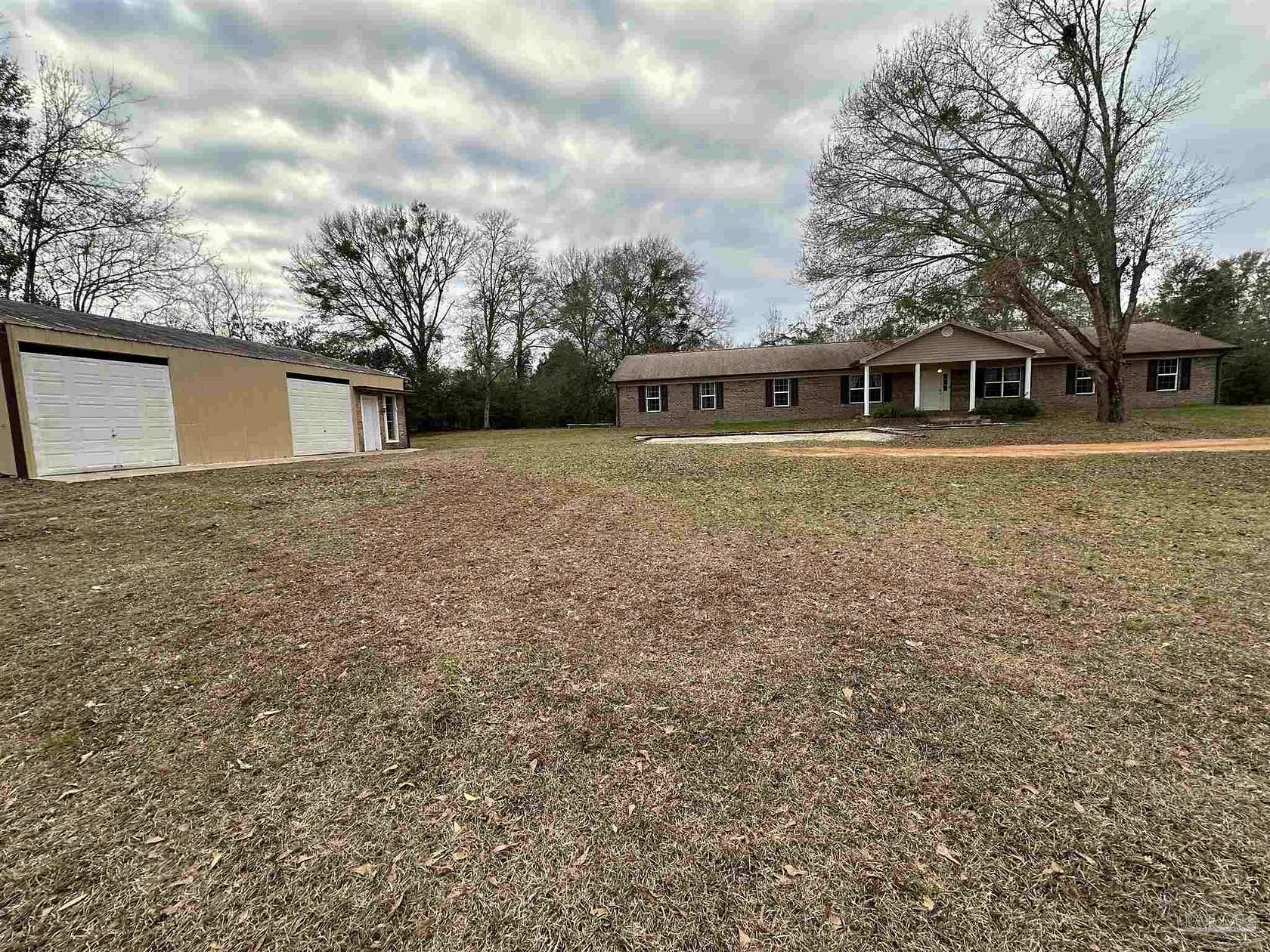 2.3 Acres of Residential Land with Home for Sale in Cantonment, Florida