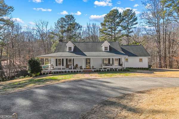 5.43 Acres of Residential Land with Home for Sale in Flowery Branch, Georgia