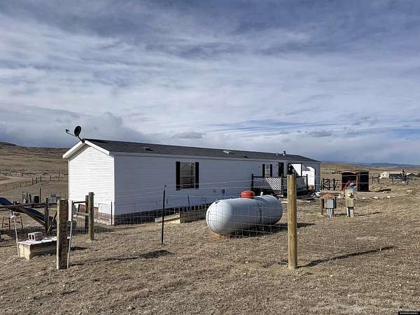 5 Acres of Land with Home for Sale in Buffalo, Wyoming
