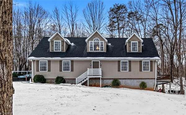 5.6 Acres of Land with Home for Sale in Hamptonville, North Carolina