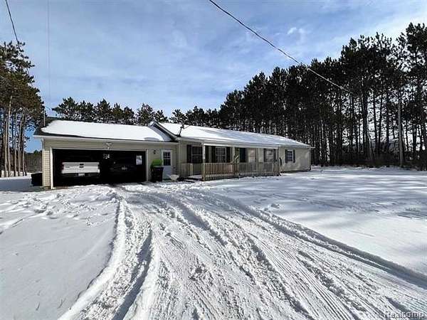 2 Acres of Residential Land with Home for Sale in McBain, Michigan