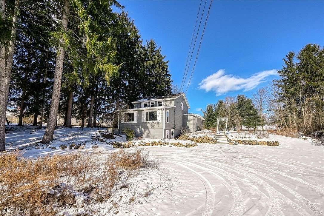 1.5 Acres of Residential Land with Home for Sale in Aurora, Ohio