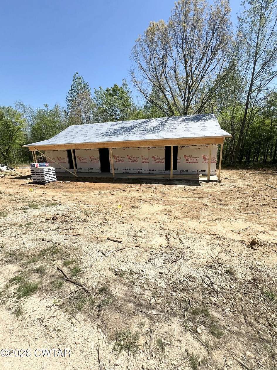 1.52 Acres of Land with Home for Sale in Lexington, Tennessee
