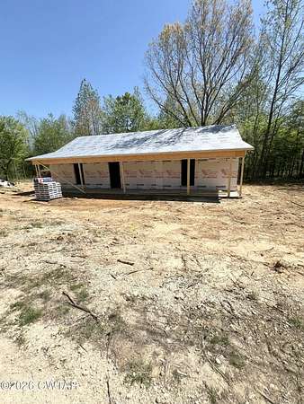 1.52 Acres of Land with Home for Sale in Lexington, Tennessee