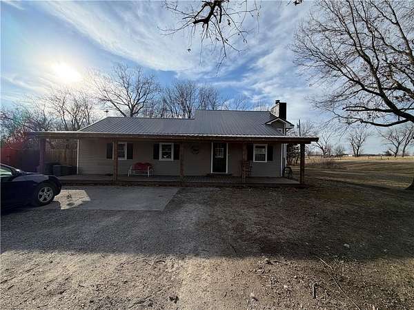 2.79 Acres of Residential Land with Home for Sale in Lathrop, Missouri