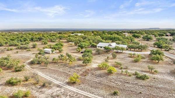 25.3 Acres of Land with Home for Sale in Round Mountain, Texas