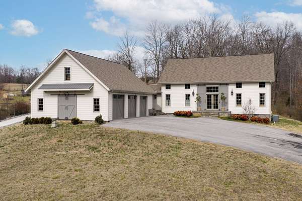 9.7 Acres of Land with Home for Sale in Dickson, Tennessee