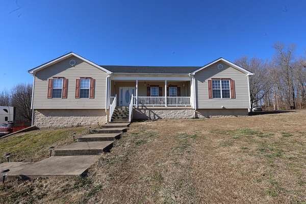 1.65 Acres of Residential Land with Home for Sale in Centerville, Tennessee