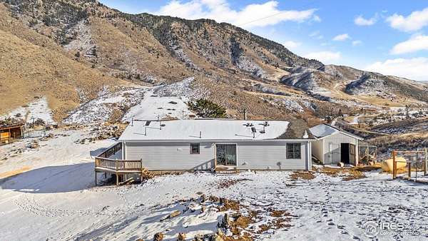 36.2 Acres of Recreational Land with Home for Sale in Bellvue, Colorado