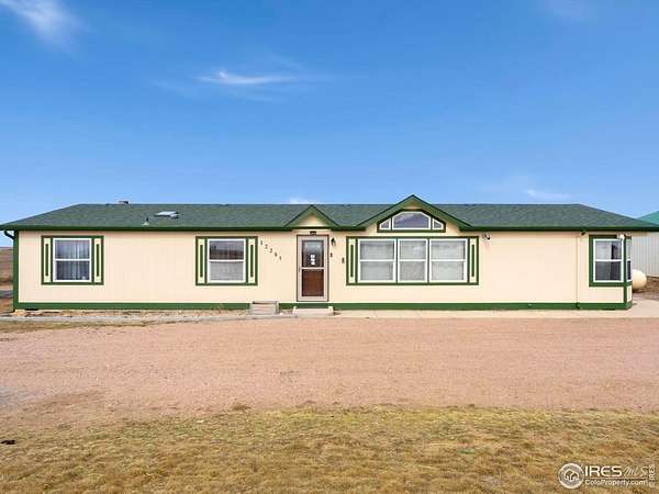 29.5 Acres of Recreational Land with Home for Sale in Pierce, Colorado