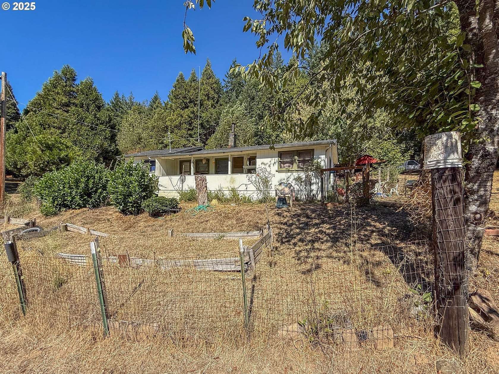 24.2 Acres of Land with Home for Sale in Camas Valley, Oregon