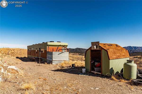 7.5 Acres of Land with Home for Sale in Texas Creek, Colorado