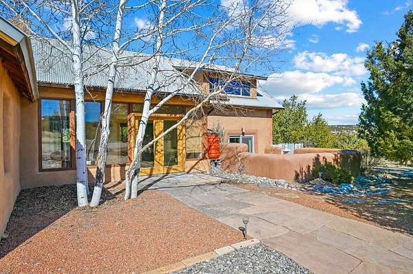 5.86 Acres of Residential Land with Home for Sale in Lamy, New Mexico