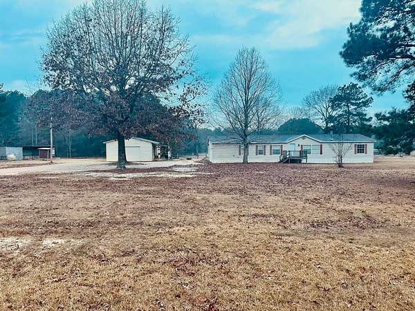 5 Acres of Residential Land with Home for Sale in Magnolia, Arkansas