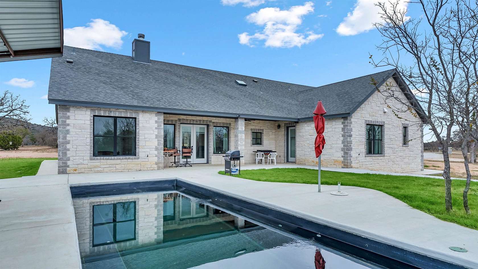 5 Acres of Residential Land with Home for Sale in Kingsland, Texas