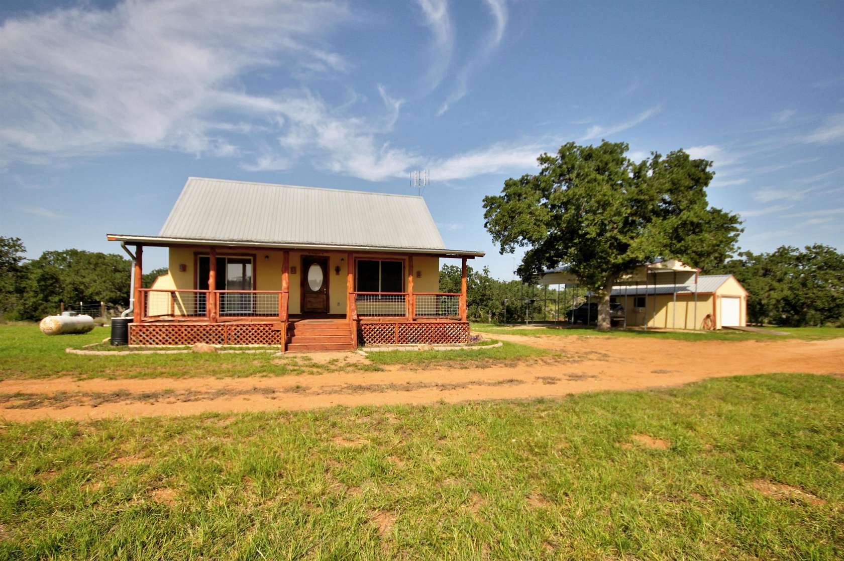26.5 Acres of Agricultural Land with Home for Sale in Llano, Texas