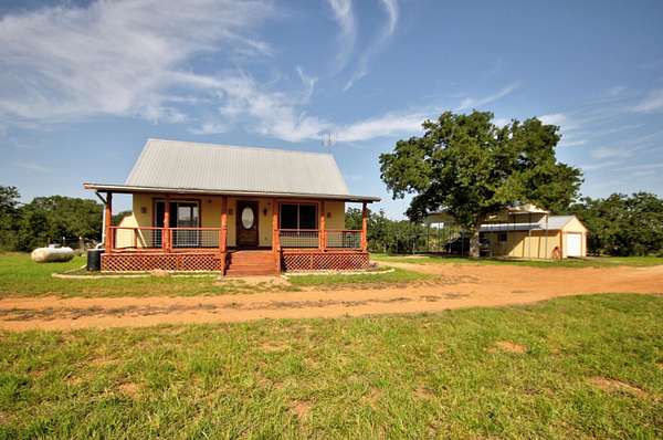 26.5 Acres of Agricultural Land with Home for Sale in Llano, Texas