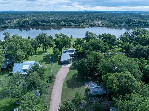 1.5 Acres of Land with Home for Sale in Cottonwood Shores, Texas