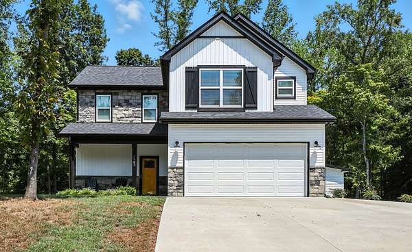 1.5 Acres of Residential Land with Home for Sale in Palmyra, Tennessee