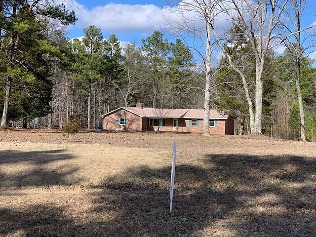 7.35 Acres of Residential Land with Home for Sale in Hohenwald, Tennessee