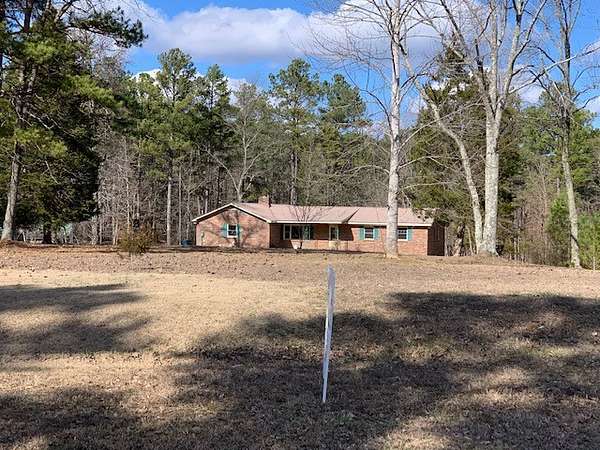 7.35 Acres of Residential Land with Home for Sale in Hohenwald, Tennessee