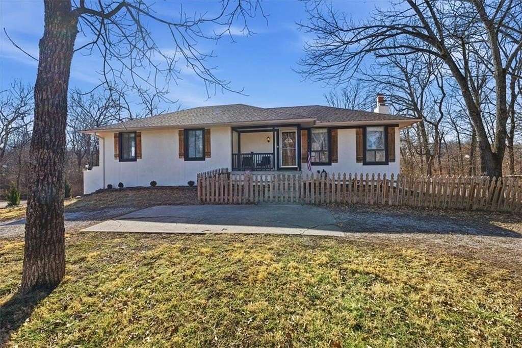 2.48 Acres of Residential Land with Home for Sale in Peculiar, Missouri