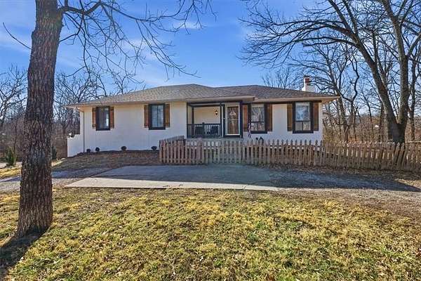 2.48 Acres of Residential Land with Home for Sale in Peculiar, Missouri