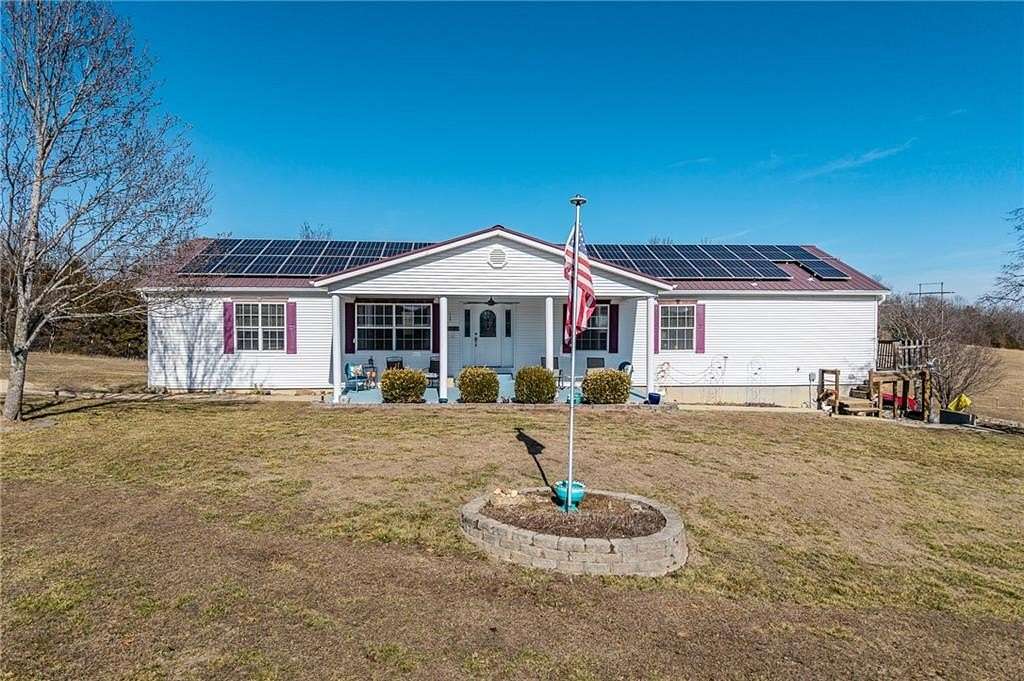 32.9 Acres of Recreational Land with Home for Sale in Richland, Missouri