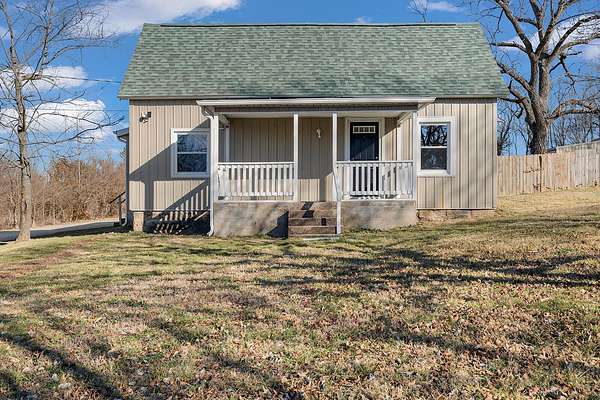 2 Acres of Residential Land with Home for Sale in Pleasant Hope, Missouri